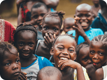 Smiling African children group outdoors – Mission smile charity